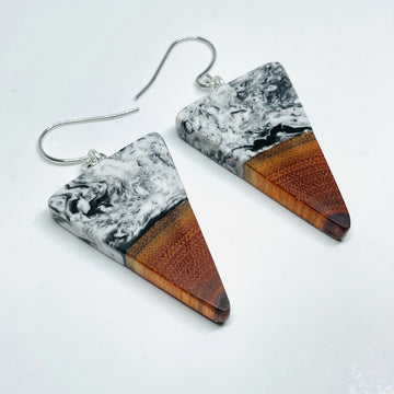 handmade jewelry, Minnesota local wood and resin artist. black and white marbled resin with buckthorn wood, nickel free dangle earrings isosceles shaped