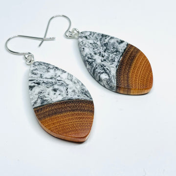 handmade jewelry, Minnesota local wood and resin artist. black and white marbled resin with buckthorn wood, nickel free dangle earrings pod shaped