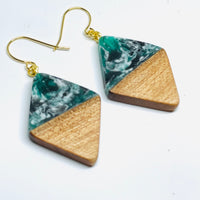 handmade jewelry, Minnesota local wood and resin artist. Dark green, black and white swirled e resin with maple wood, nickel free dangle earrings diamond shaped