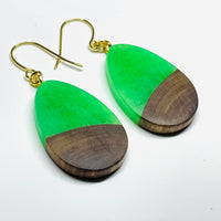 handmade jewelry, Minnesota local wood and resin artist. Green Glow-In-The-Dark resin with a walnut wood, nickel free dangle earrings teardrop shaped