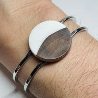 handmade jewelry, Minnesota local wood and resin artist. White resin with walnut wood, platinum plated bracelet