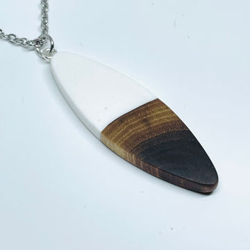 handmade jewelry, Minnesota local wood and resin artist. handmade walnut wood and resin pendant necklace, 15" stainless steel chain, opaque white blue