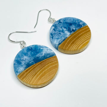 handmade jewelry, Minnesota local wood and resin artist. Ocean Waves blue resin with maple wood, nickel free dangle hook earrings.