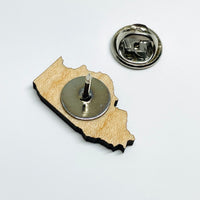 Laser cut, Minnesota local wood and resin artist. Maple wood, Stainless steel pin back, Illinois state shape.