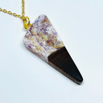 handmade jewelry, Minnesota local wood and resin artist. handmade walnut wood and resin pendant necklace, 9" gold colored stainless steel chain, purple, gold and white swirled resin.