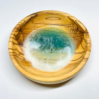 handmade jewelry, Minnesota local wood and resin artist. Ocean waves blue, sea foam, olive wood turned ring trinket bowl.