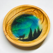 handmade jewelry, Minnesota local wood and resin artist. Northern lights, winter forest, timberwolves, pine trees, hand painted, olive wood bowl with glow-in-the-dark fluorescent green resin ring trinket bowl.