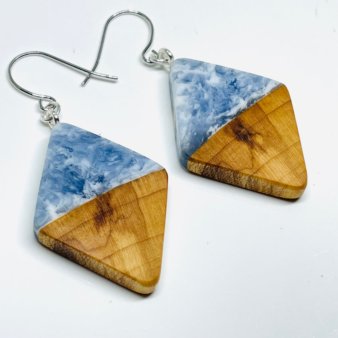 handmade jewelry, Minnesota local wood and resin artist. Ocean waves blue resin with maple wood, nickel free dangle earrings diamond shaped
