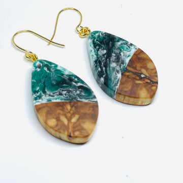 handmade jewelry, Minnesota local wood and resin artist. Dark green, black and white swirled e resin with spalted maple wood, nickel free dangle earrings pod shaped