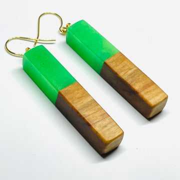 handmade jewelry, Minnesota local wood and resin artist. Green Glow-In-The-Dark resin with a spalted maple wood, nickel free dangle earrings stem shaped