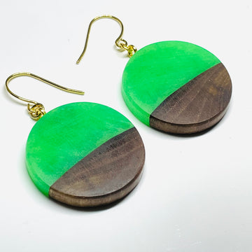 handmade jewelry, Minnesota local wood and resin artist. Green Glow-In-The-Dark resin with a walnut wood, nickel free dangle earrings circle shaped