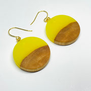 handmade jewelry, Minnesota local wood and resin artist. Yellow Glow-In-The-Dark resin with a birch wood, nickel free dangle earrings circle shaped