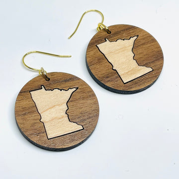 Minnesota local wood and resin artist. laser cut walnut wood with mapleinlay, nickel free dangle earrings circle shaped with MN State cutout.