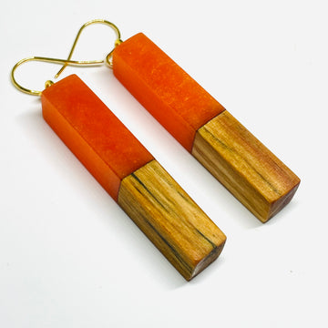 handmade maple wood and orange resin earrings.