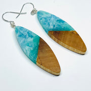 handmade jewelry, Minnesota local wood and resin artist. Ocean waves blue, green and white resin with maple wood, nickel free dangle earrings large sliver shaped