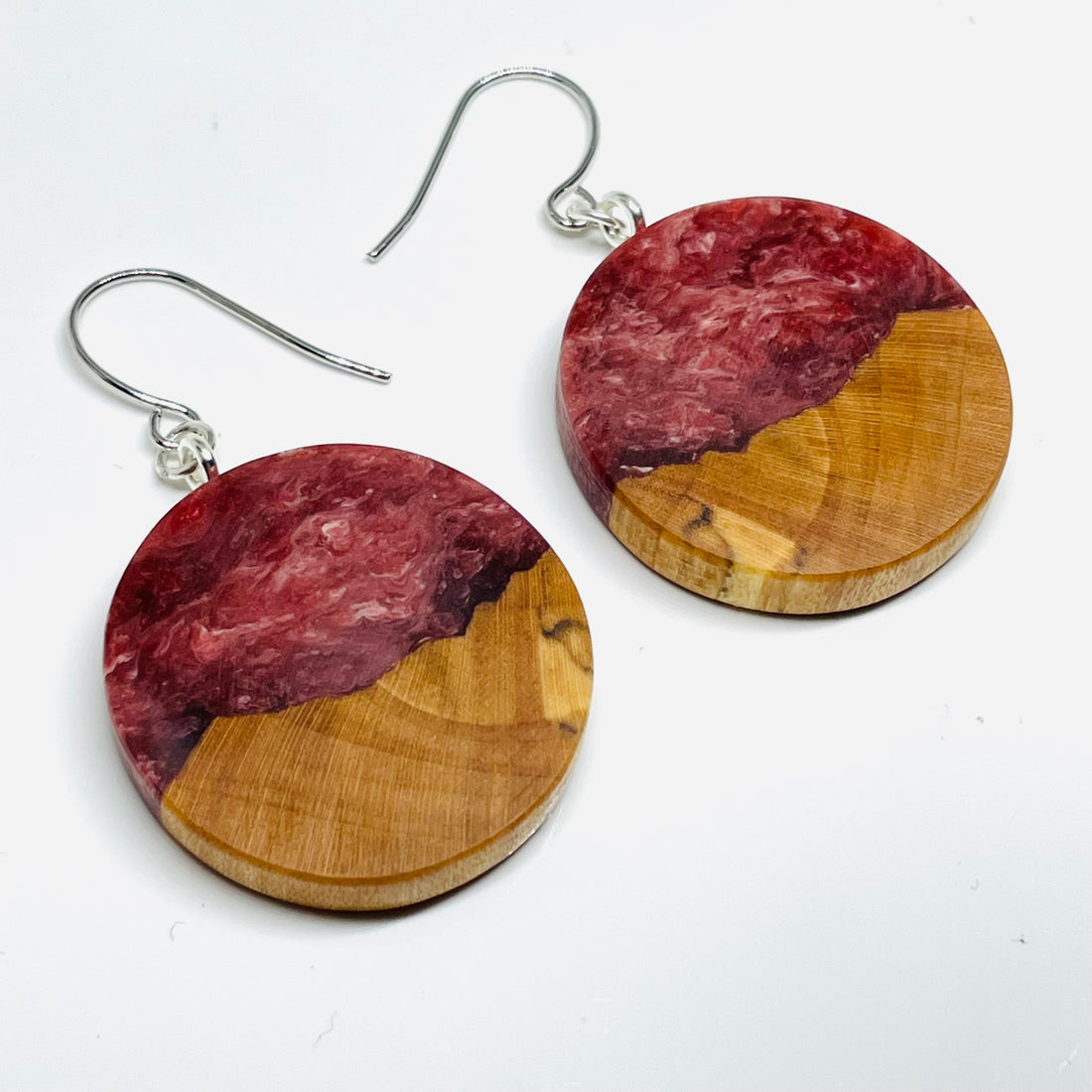 handmade jewelry, Minnesota local wood and resin artist. Deep red and white swirled resin with spalted maple wood, nickel free dangle earrings circle shaped
