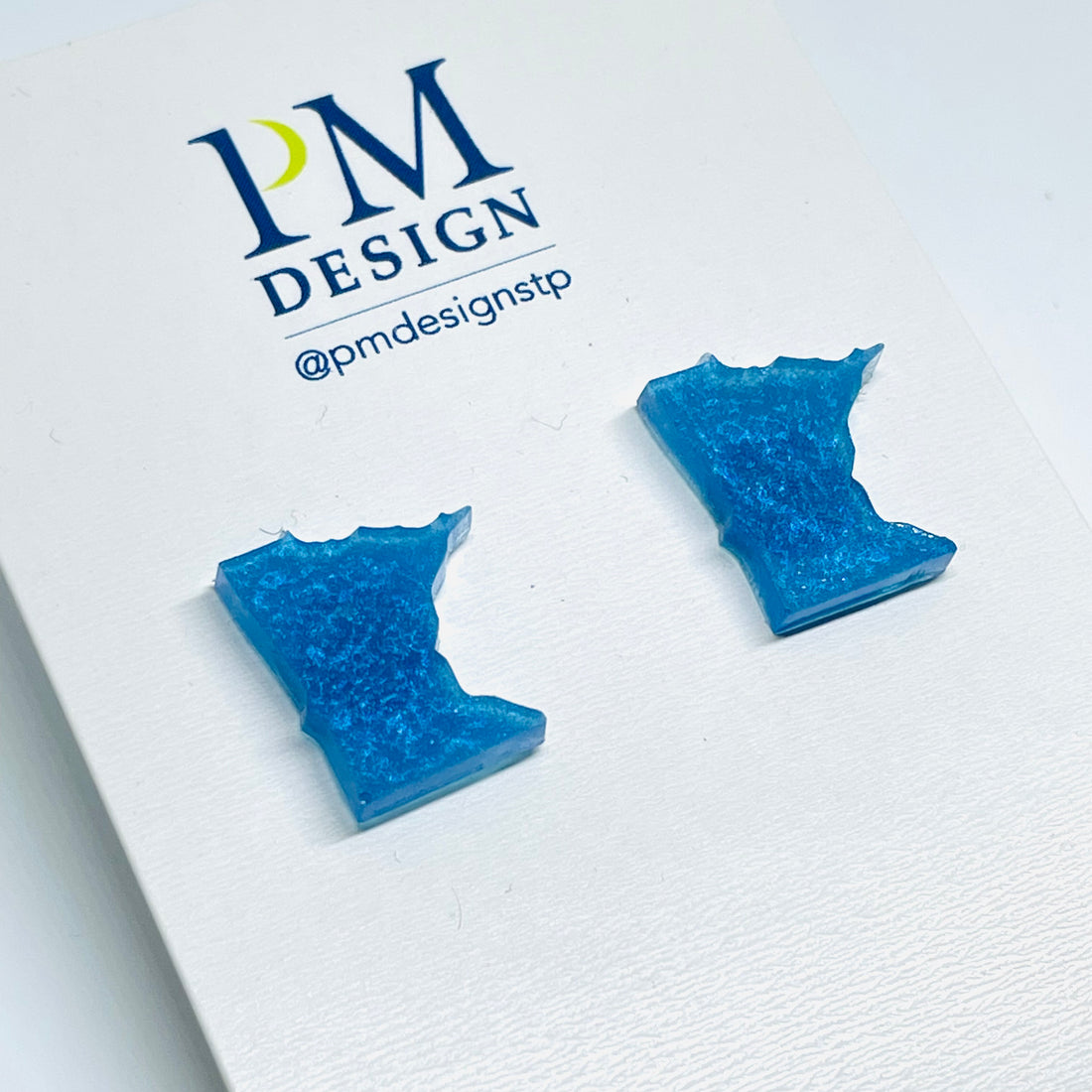 Tiny Minnesota shaped stud/post earrings - Blue resin