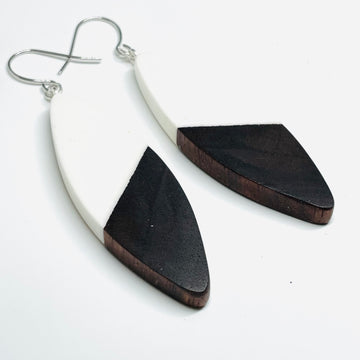 handmade jewelry, Minnesota local wood and resin artist. Opaque white resin with walnut wood, nickel free dangle earrings sliver shaped