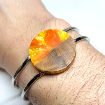 handmade jewelry, Minnesota local wood and resin artist. Orange and yellow resin with maplewood, platinum plated bracelet