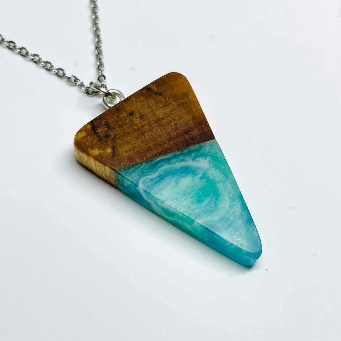 handmade jewelry, Minnesota local wood and resin artist. handmade spalted maple wood and resin pendant necklace, 9" stainless steel chain, ocean waves blue, green and white resin.