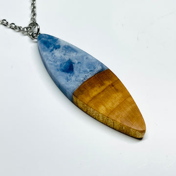 Handmade pendant/necklace from&nbsp;maple wood with dark blue&nbsp;and white resin.