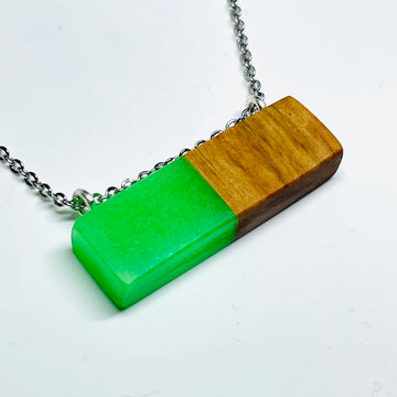 handmade jewelry, Minnesota local wood and resin artist. handmade white oak wood and green glow-in-the-dark resin pendant necklace, 9" stainless steel chain.