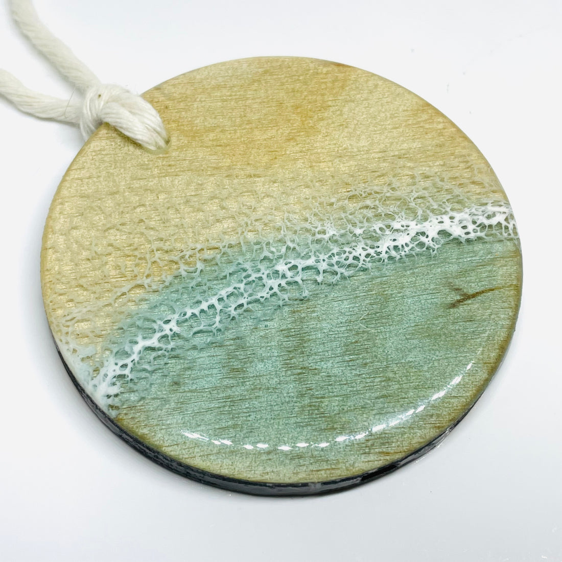 handmade jewelry, Minnesota local wood and resin artist. Ocean waves, sea foam blue and white resin Christmas, holiday ornament