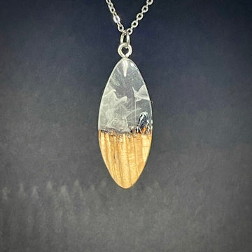 handmade jewelry, Minnesota local wood and resin artist. handmade ash wood and clear and white resin pendant necklace, 9" stainless steel chain, Winter blizzard mountain landscape short sliver.