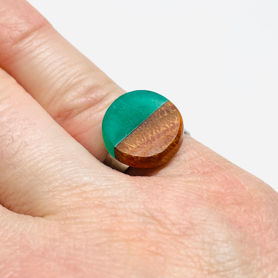 handmade jewelry, Minnesota local wood and resin artist. emerald green resin and buckthorn wood, stainless steel ring.