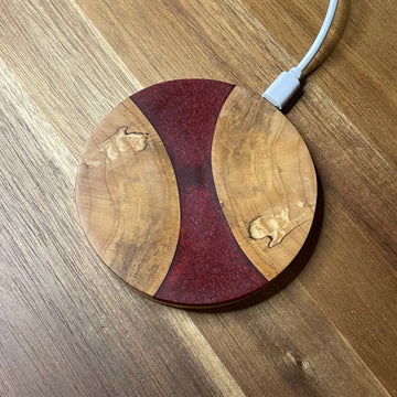 15W Qi Wireless Phone Charger.&nbsp;Made of maple wood with red resin. Size: 3.875"Diameter x .5"D Comes with a 3' Type C Micro to USB cord.