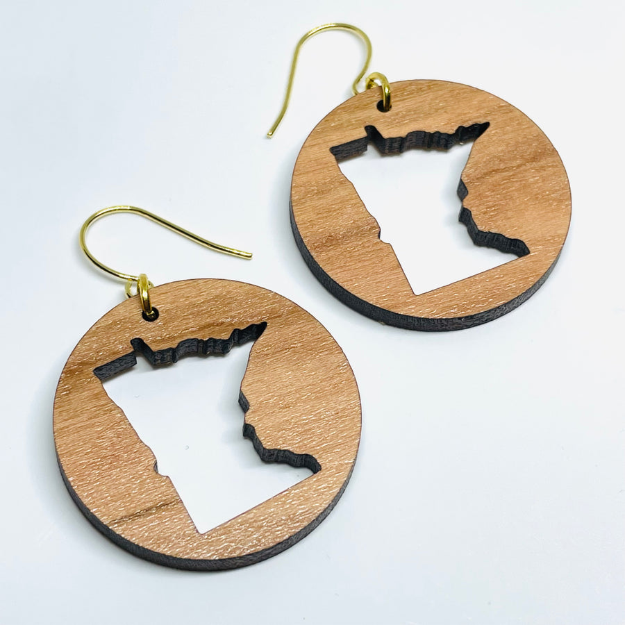 Minnesota local wood and resin artist. laser cut cherry wood, nickel free dangle earrings circle shaped with MN State cutout.