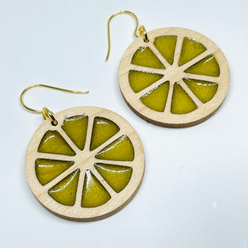 Laser Cut earrings with lemon yellow resin. , Minnesota local wood and resin artist. Maple wood, nickel free dangle earrings citrus slice circle shaped