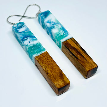 handmade jewelry, Minnesota local wood and resin artist. Ocean waves blue, green and white resin with maple wood, nickel free dangle earrings stem shaped