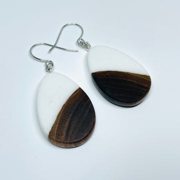 handmade jewelry, Minnesota local wood and resin artist. Opaque white resin with walnut wood, nickel free dangle earrings teardrop shaped