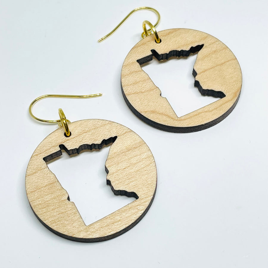 Minnesota local wood and resin artist. laser cut maple wood, nickel free dangle earrings circle shaped with MN State cutout.