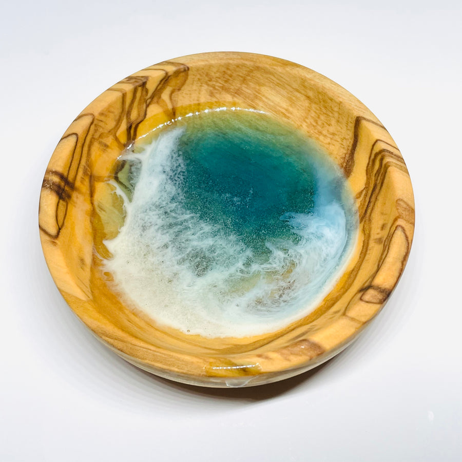 handmade jewelry, Minnesota local wood and resin artist. Ocean waves blue, sea foam, olive wood turned ring trinket bowl.